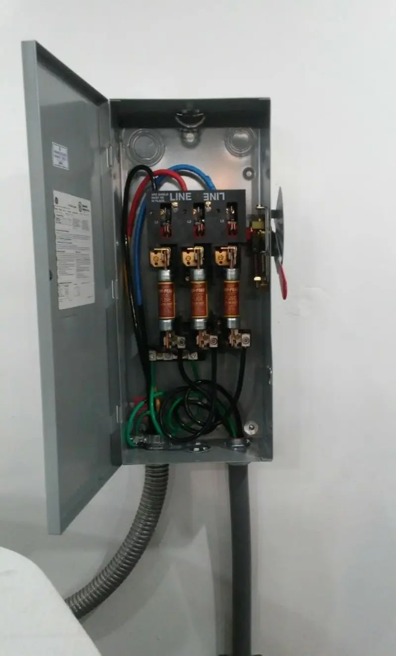Three-phase disconnect switch installed for Smoke Detector Installation in Lewisville